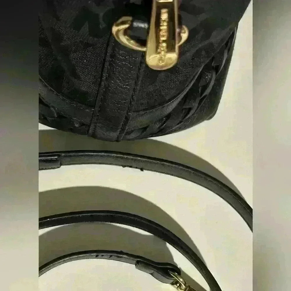 A Mickael Kors black Gladstone satchel with gold tone hardware. - Picture 12 of 14